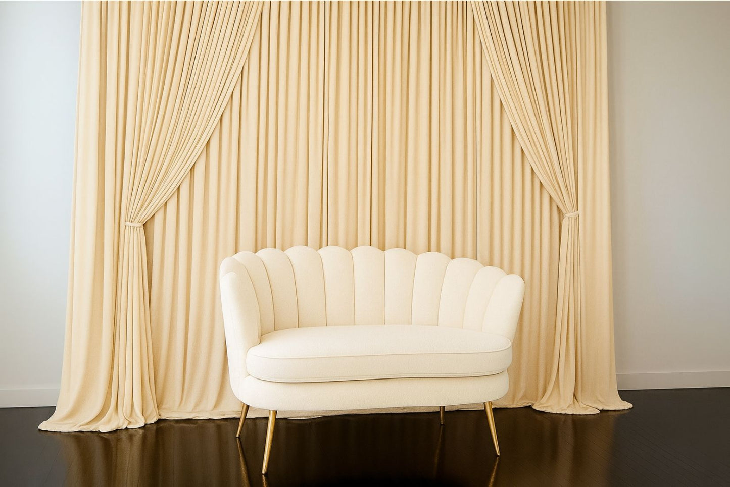 Beige pipe and drape backrop rental with off white chair