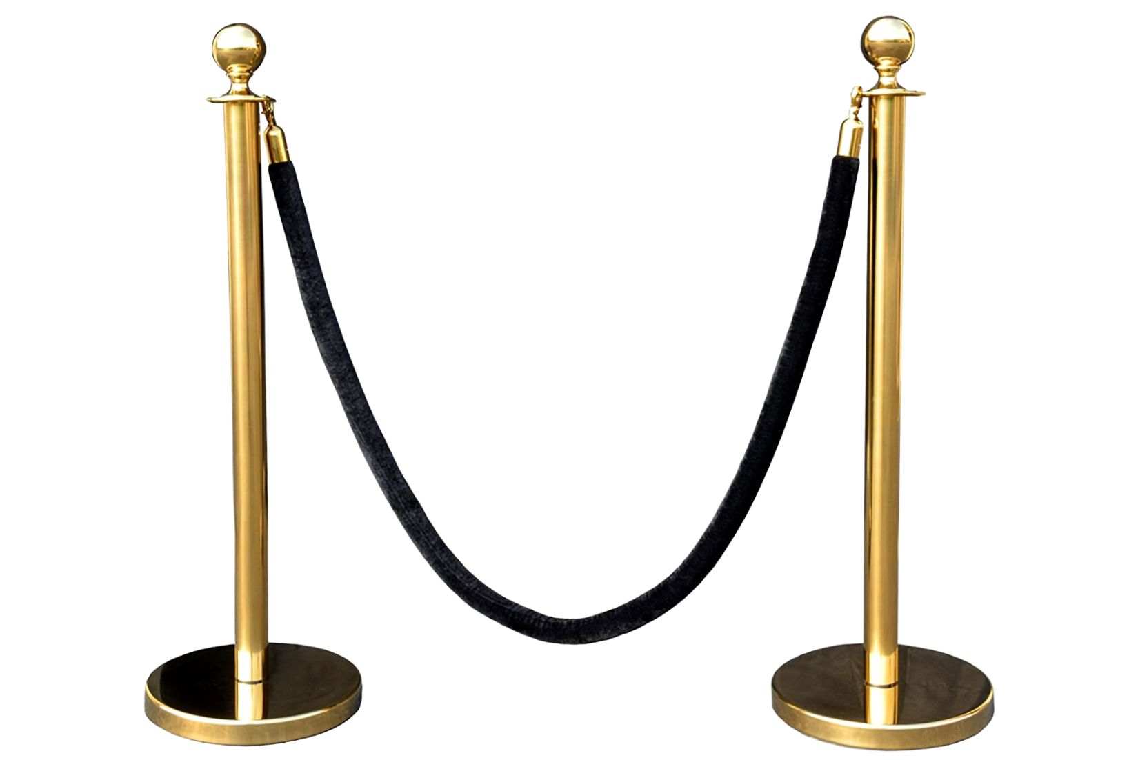 Two brass stanchions with a black velvet rope