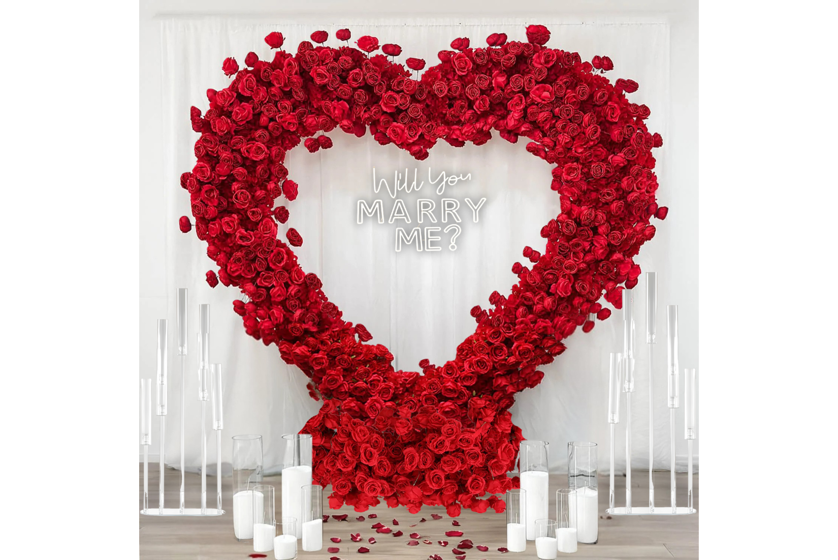 Will you marry me neon sign hanging from red rose heart.