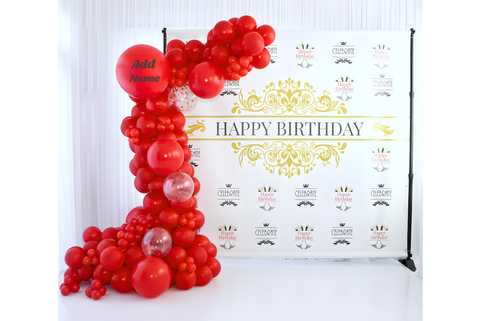 Red balloon garland with custom text and step and repeat banner.