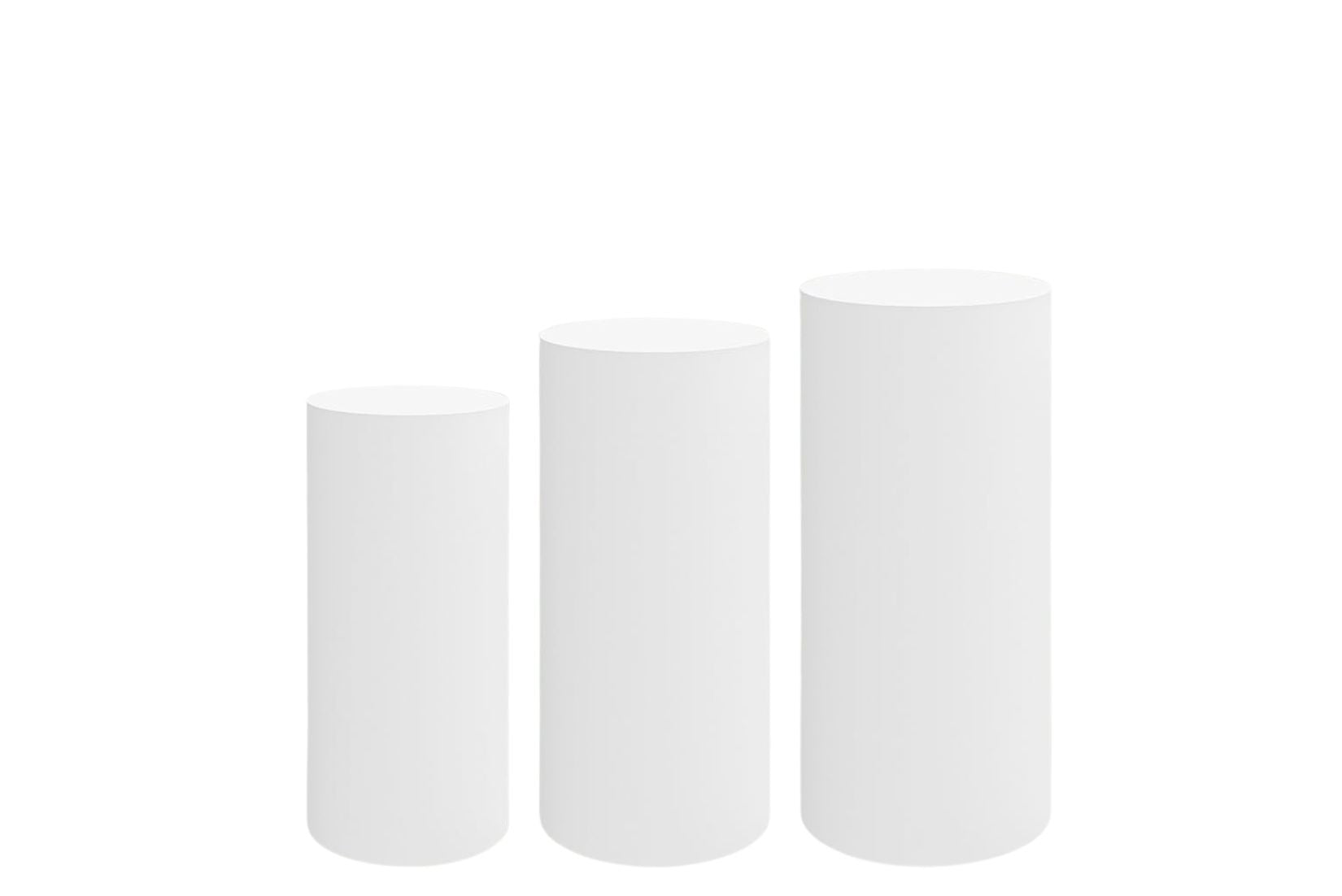 Three white pedestals of different sizes for cakes or any desserts