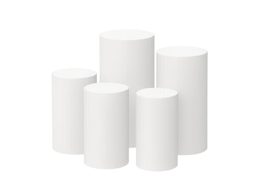 Set of five white cake cylinders on a white background