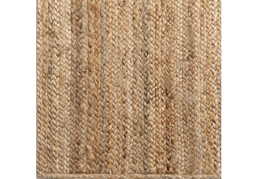 Boho inspired jute wicker rug with natural brown tones.
