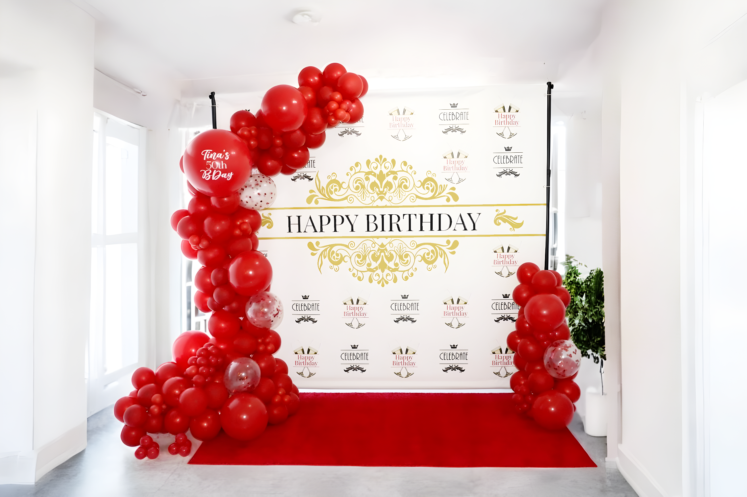 Happy birthday step and repeat banner with red custom balloon garland.