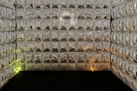 Photo booth enclosure with reflective silver mirror balloons