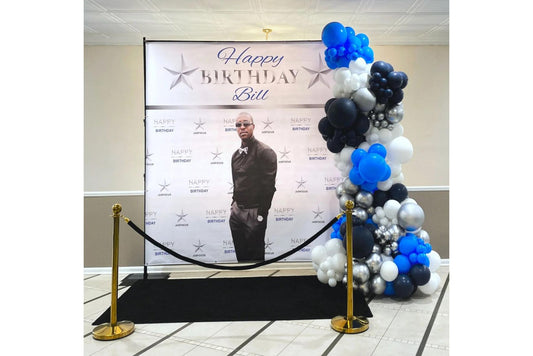 Balloon garland and custom Dallas Cowboys happy birthday backdrop with the colors navy blue, royal blue, silver and white