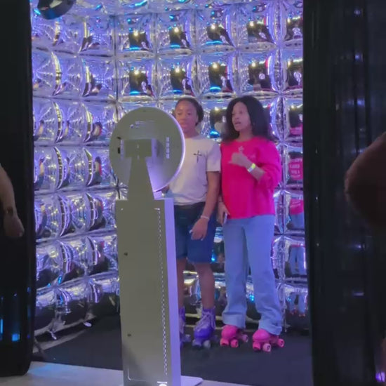 Video of Isiah58 roller rink with photo booth