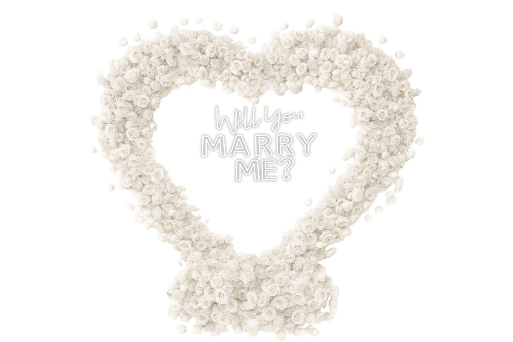 Heart-shaped arrangement of white flowers with 'Will You Marry Me?' text.